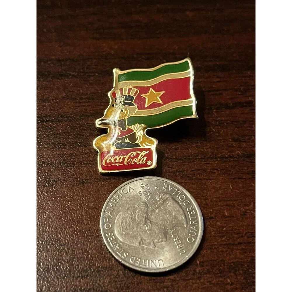 Vintage 1984 Los Angeles Olympics Coca‎ Cola Sam Eagle Surinam Flag Lapel Pin